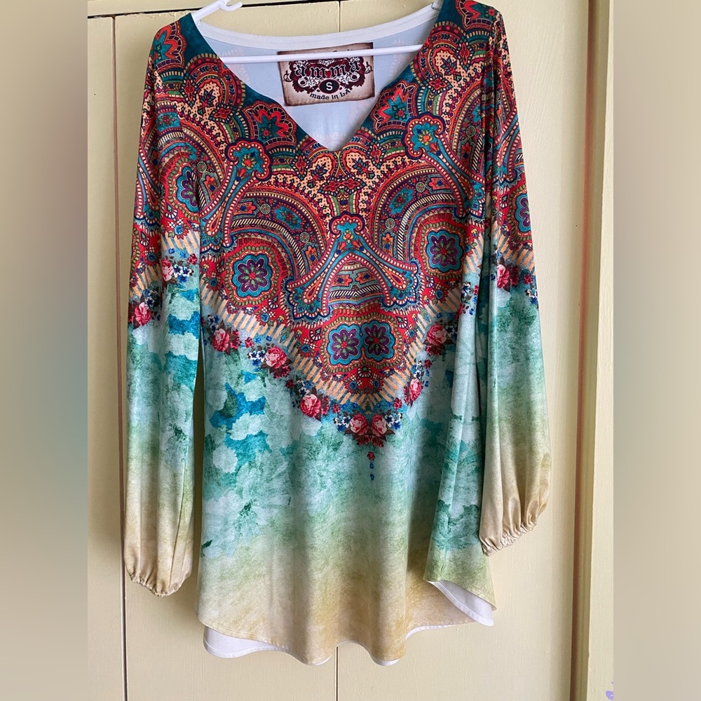 New, never worn. Boutique boho top-can be worn with leggings or as a mini